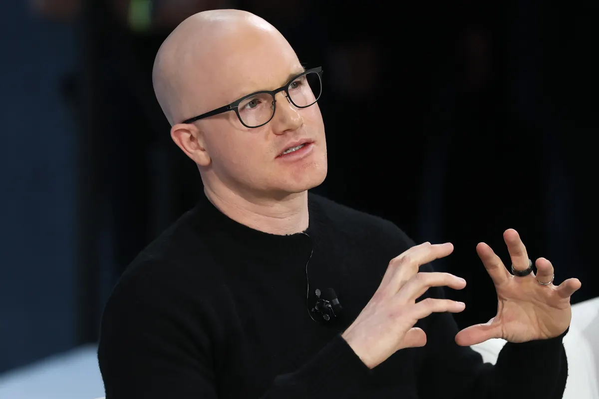CEO Coinbase lên tiếng về đáy bitcoin, AI và cuộc chiến với CEO JPMorgan